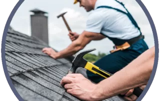 Roofers from a residential roofing company working on a home's roof.